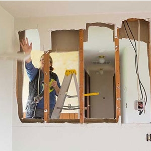 demoing a wall in a home